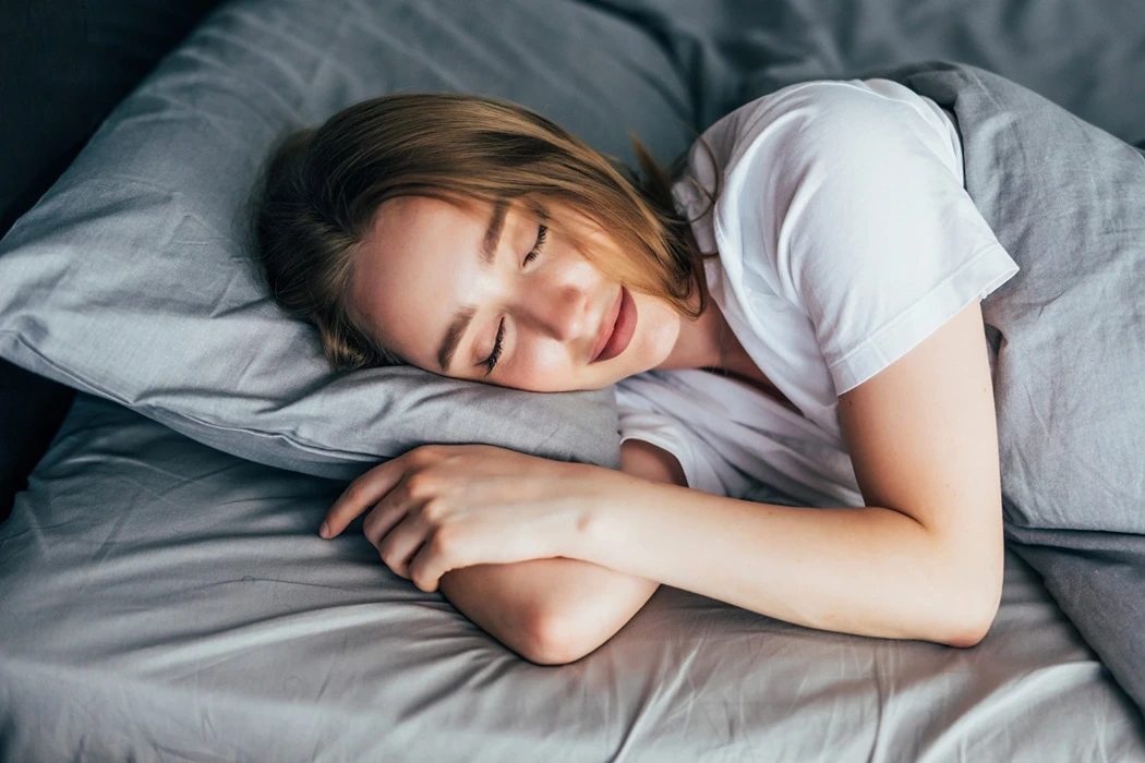 woman sleeping with hemp oil